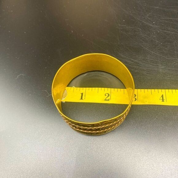 Ladies 8” brass bangle w/intricate engraving that appears to be Eastern Indian - Picture 4 of 10